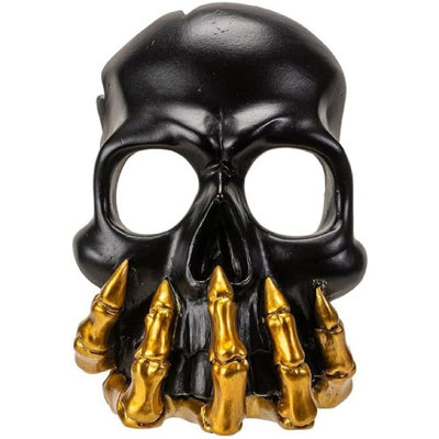 Porte-bougie noir avec masque à tête de mort fantôme noir sur squelette doré