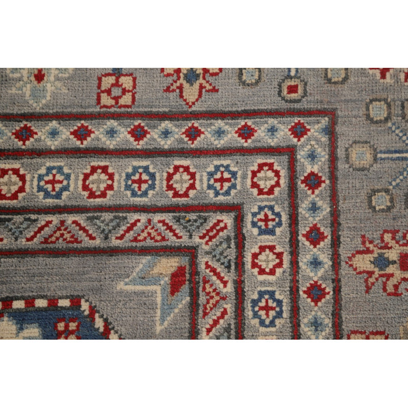 Tapis oriental à motif géométrique Kazak 10