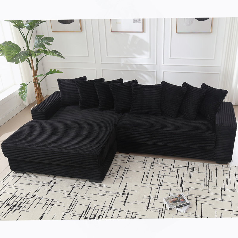 Canapé confortable surdimensionné en velours côtelé avec plusieurs coussins pour la détente