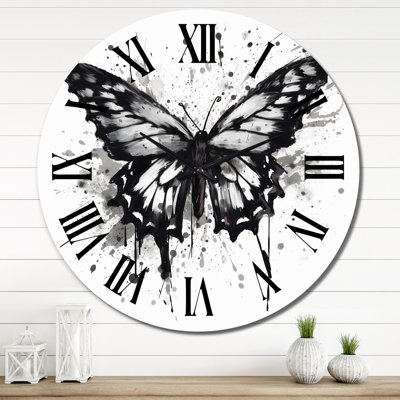 Horloge murale papillon