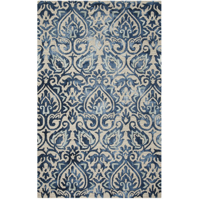 Tapis géométrique en laine / coton touffeté à la main Pimentel