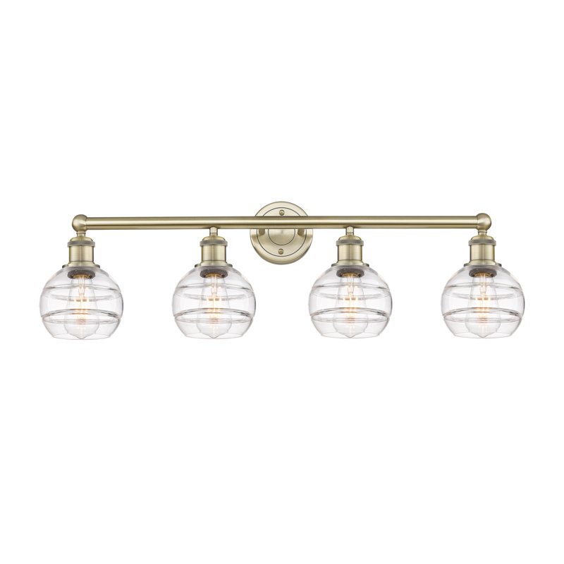 Éclairage pour meuble-lavabo à 4 lumières Chartoff, Transparent, Laiton antique