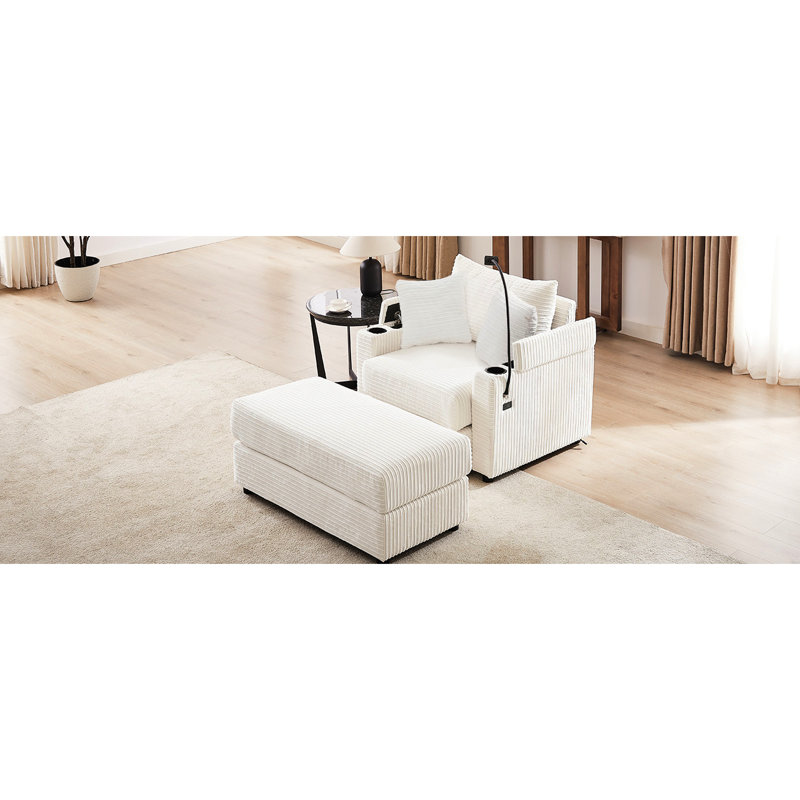 Beige avec rangement et éléments mobiles. 2 ports, porte-gobelets, porte-téléphone. Siège confortable, fabrication dissimulée. Velours côtelé relaxant