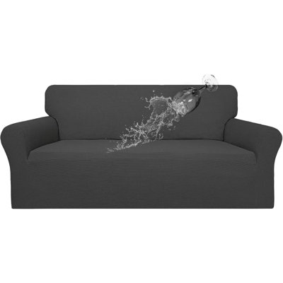 Housse imperméable et extensible pour canapé