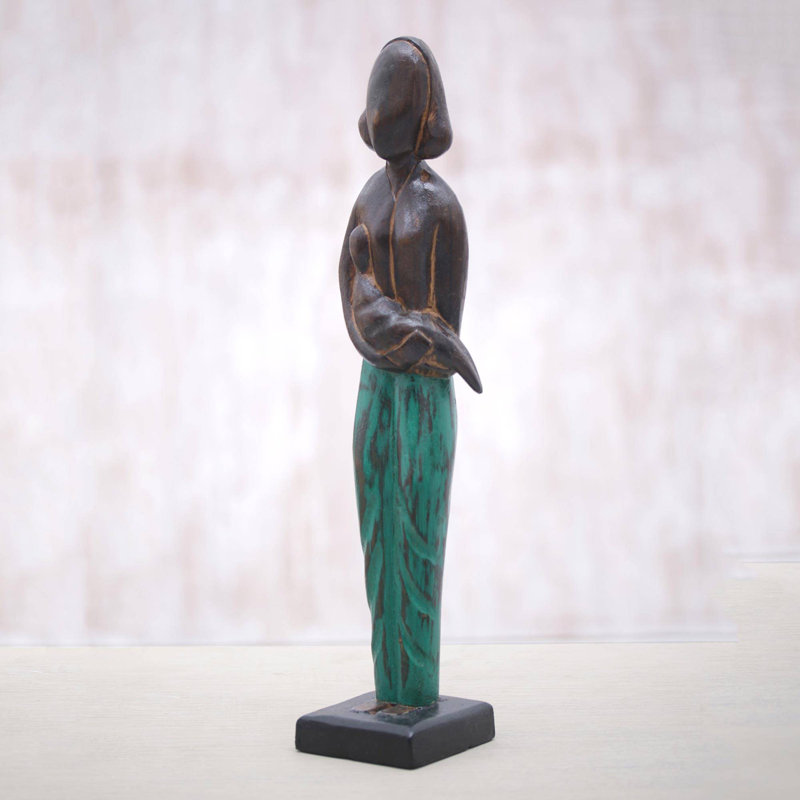 Jolie sculpture en bois mère
