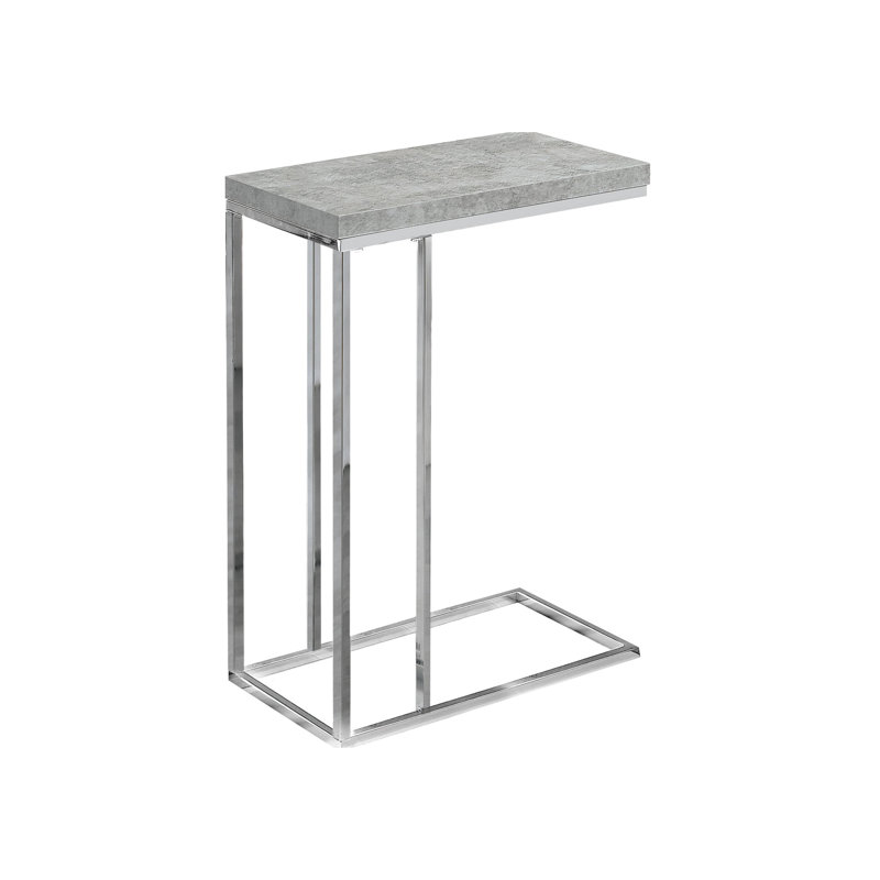 Table moderne avec stratifié en ciment texturé gris et métal - côté salon de la pièce, aire de repos
