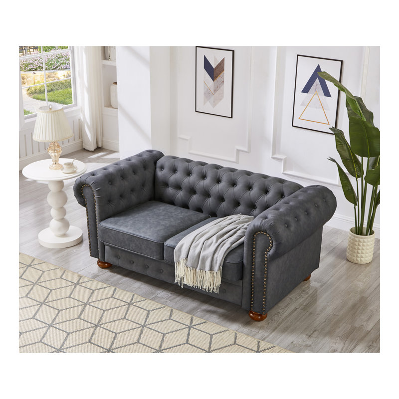 Causeuse de canapé classique en similicuir Chesterfield