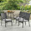 De 4 chaises empilables en PE gris avec structure en fer, coussins à eau, courbées pour décorer le patio extérieur et détendre les sièges