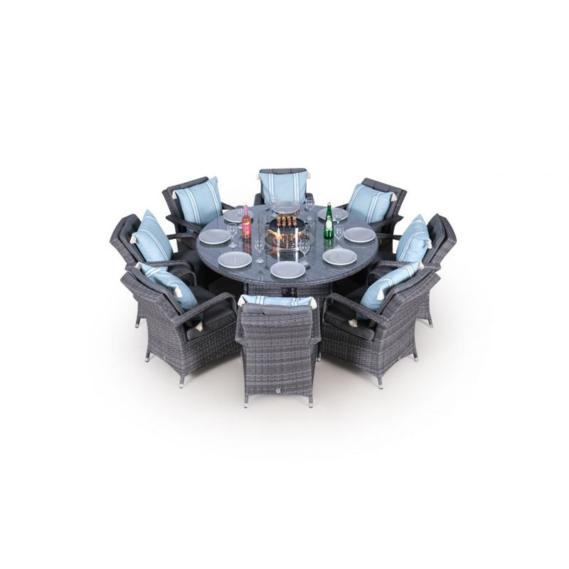 Otero 8 - Person Wicker Patio Dining Set with Round Table , Cushions Included, Grey, Grey/Light Blue