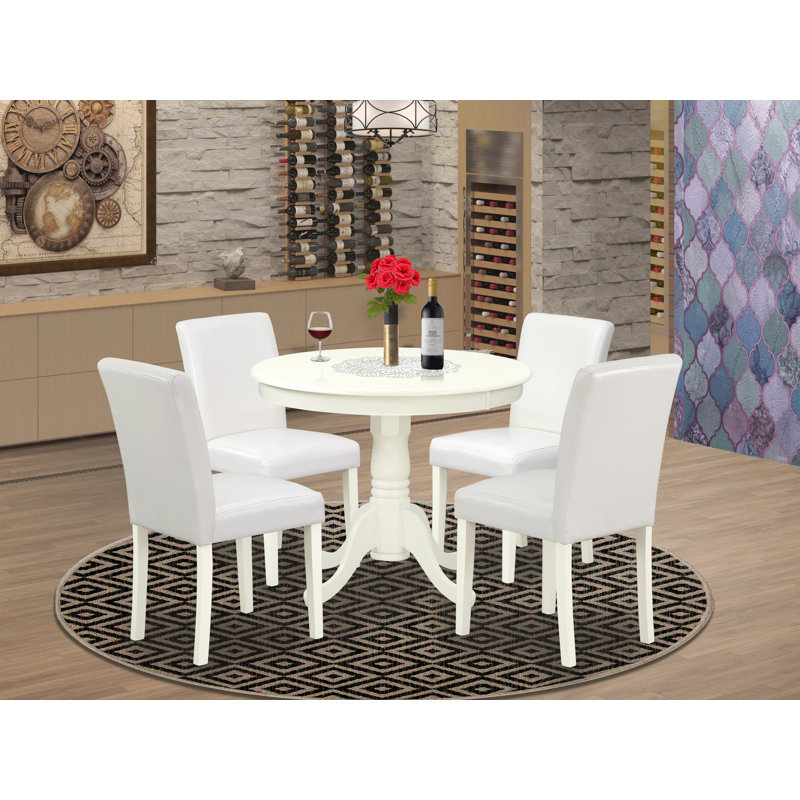 L'ensemble de 3 tables de salle à manger modernes comprend une table de cuisine ronde avec piédestal et 2 chaises rembourrées en similicuir blanc, lin blanc