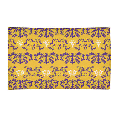 Tapis damassé jaune / mauve