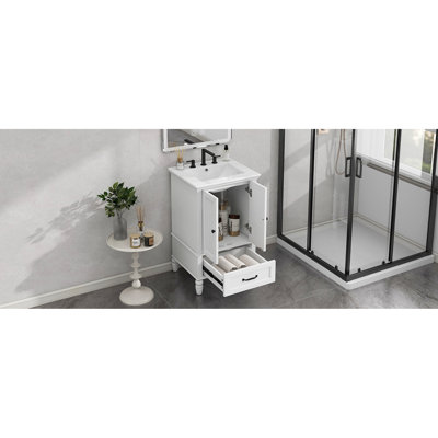 Meuble-lavabo de 20 po avec lavabo central, armoire à deux portes, tiroir, bouchon magnétique, charnières en acier inoxydable, peinture blanche, pieds réglables à assemblage requis, conception moderne