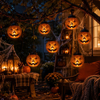 Décoration d'Halloween : Citrouille lumineuse portative avec poignée, figurine décorative DEL au visage lumineux, idéale pour décorer une table, un porche, une maison ou une fête à l'intérieur ou à l'extérieur.