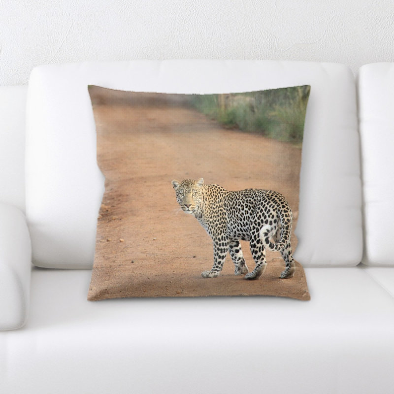 Coussin en jeté leopard