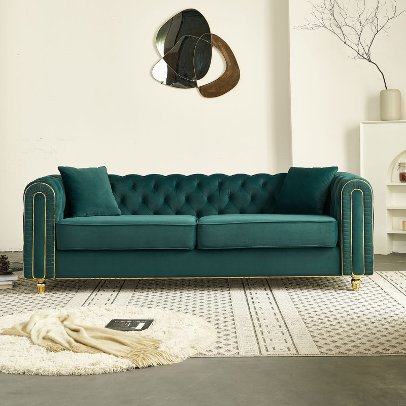 Canapé capitonné avec 2 coussins décoratifs
