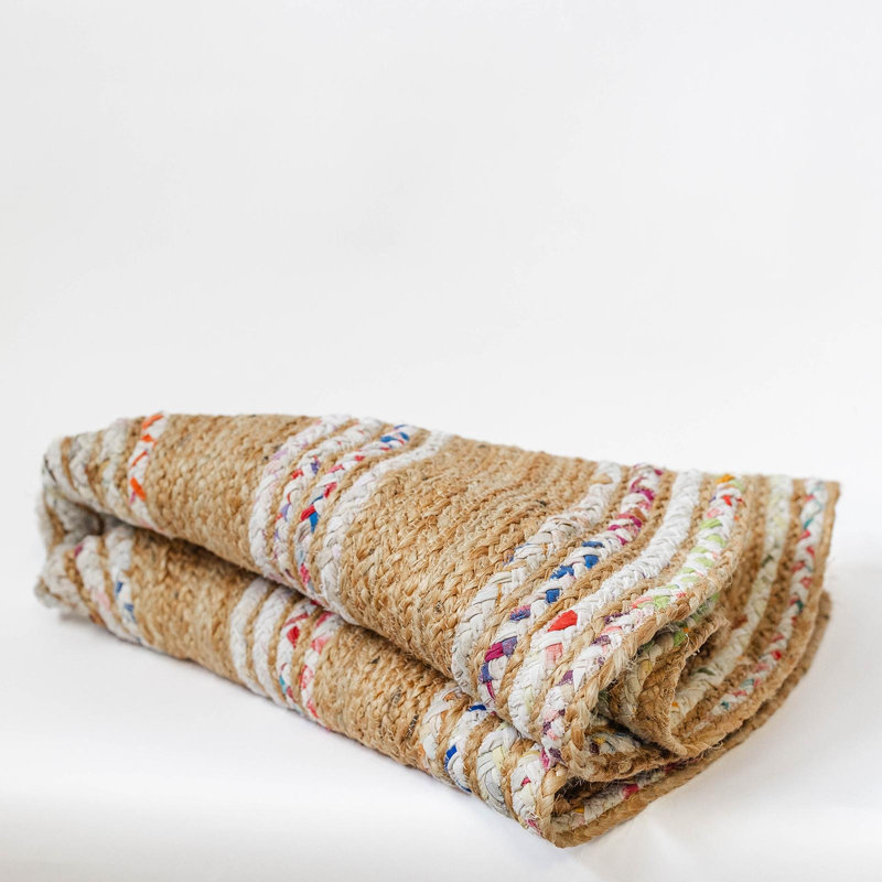 Tapis rond en jute à rayures colorées