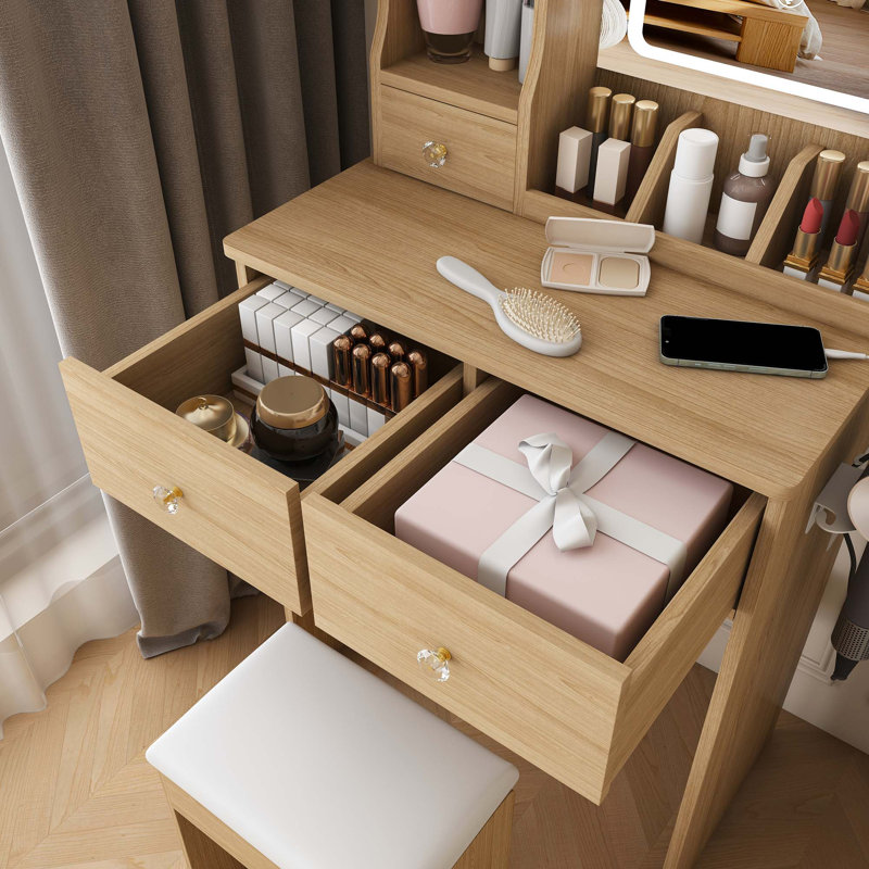 Petit meuble-lavabo moderne avec 3 modes d'éclairage DEL à luminosité réglable, 3 tiroirs et plusieurs tablettes de rangement ouvertes, un support pour sèche-cheveux et une prise de courant