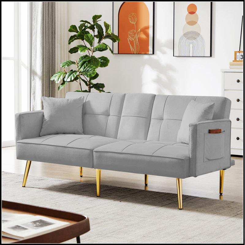 Luxueux canapé-lit en velours avec dossier réglable pour une assise et un sommeil confortables, parfait pour les petits espaces.