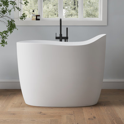 Baignoire autoportante à surface solide de 47 po avec siège intégré, baignoire de trempage en résine de couleur blanc mat, baignoire autoportante compacte pour petits espaces