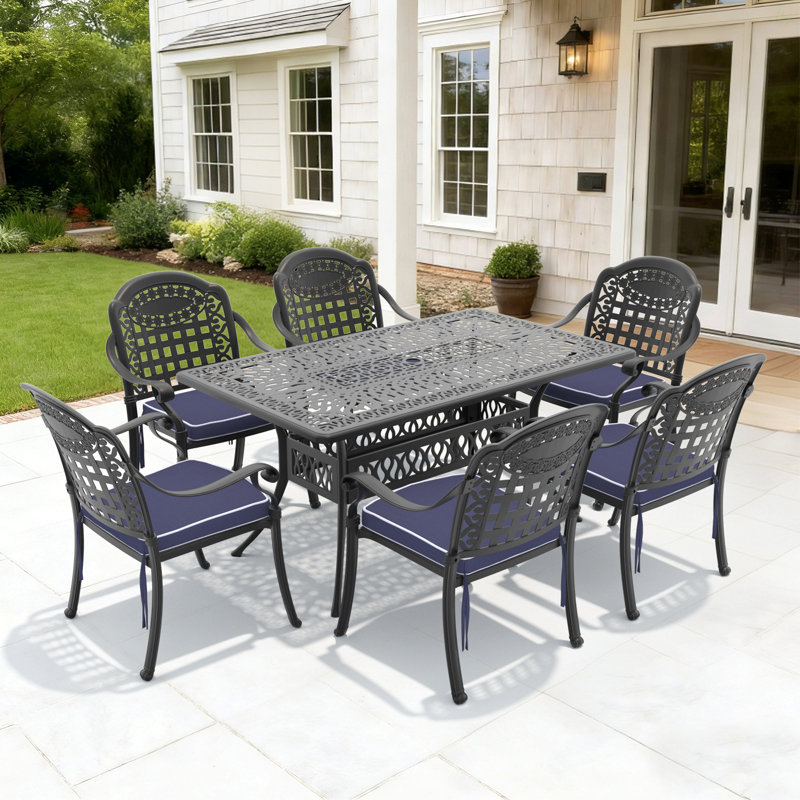 7-Piece Set Of Cast Aluminum Patio Furniture With Black Frame And Blue Seat Cushions