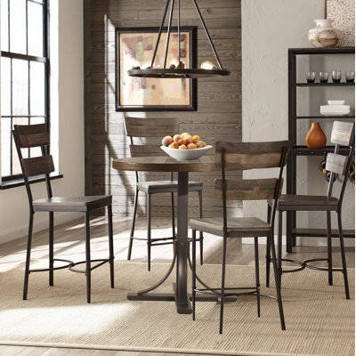Huley 4 - Person Pedestal Dining Set