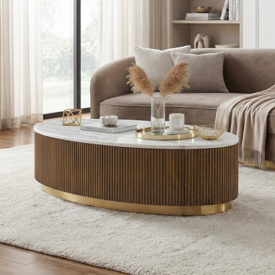 Table basse ovale en marbre Kirtin avec base dorée