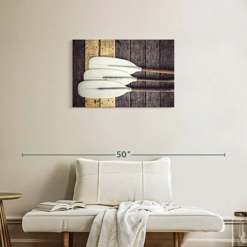 Trois raquettes blanches Sireci, H 20 po x l 30 po