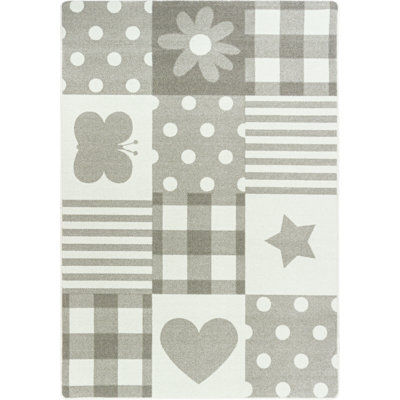 Tapis beige / blanc touffeté en patchwork