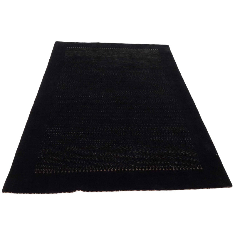 Luro Geometric Area Rug in Black