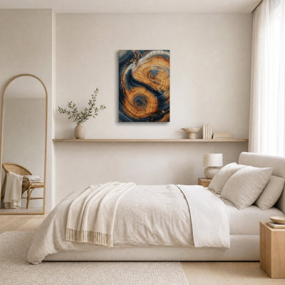Tableau sur toile représentant des anneaux d'arbres tourbillonnants bleus et bruns