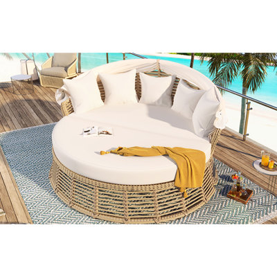 Lit de jour de patio extérieur beige avec auvent rétractable, coussins de meubles amovibles, auvent réglable et confortable pour se détendre au bord de la piscine