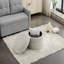Repose-pieds rond avec rangement en velours ivoire