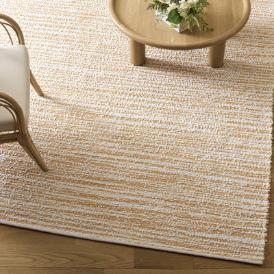 Tapis orange / ivoire en coton tissé à la main Chaida Renewal