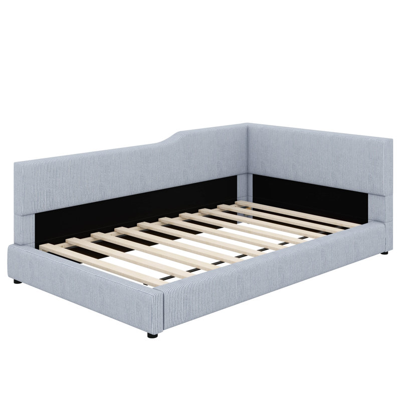 Structure de lit de jour rembourrée moderne en forme de L, avec un design de lit de plancher fabriqué avec un tissu en velours côtelé luxueux