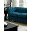 Causeuse contemporaine capitonnée de couleur bleu sarcelle à boutons capitonnés et capitonnée