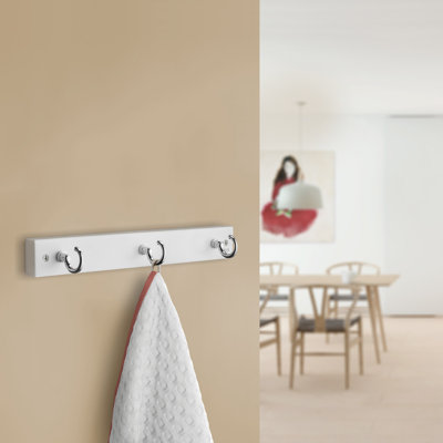Wall mounted triple hook rack