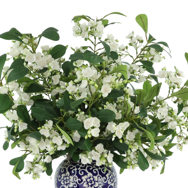 Tiges en herbe dans un vase décoratif, Blanc