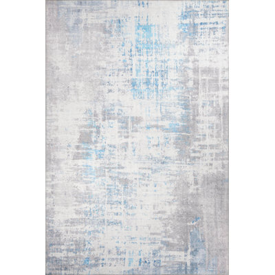 Tapis décoratif gris rayé