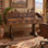 Rustic Trestle Writing Desk with 8 Drawers and Decorative Metal Hardware