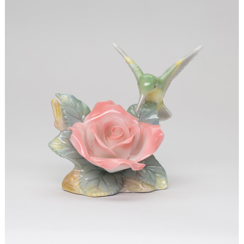 Figurine colibri avec rose de la paix