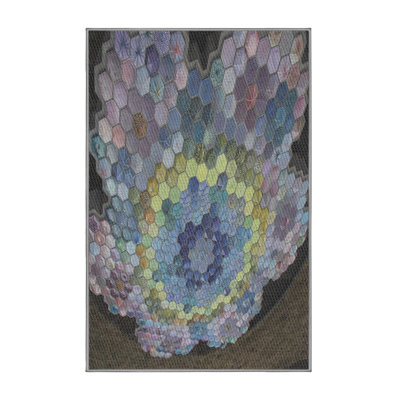 Tapis mauve / brun à motif géométrique tissé à la machine