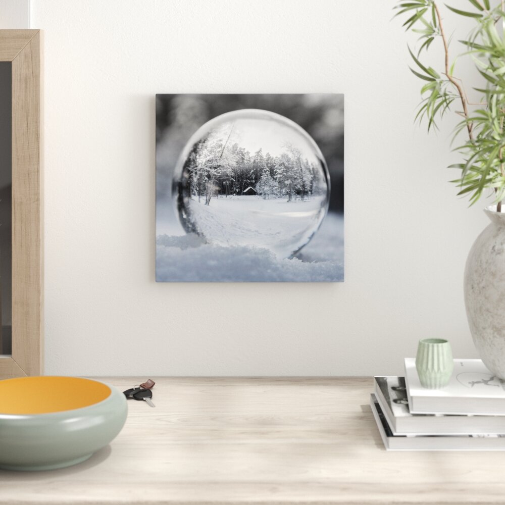 Leinwandbild Ice Ball in Winter Landscape