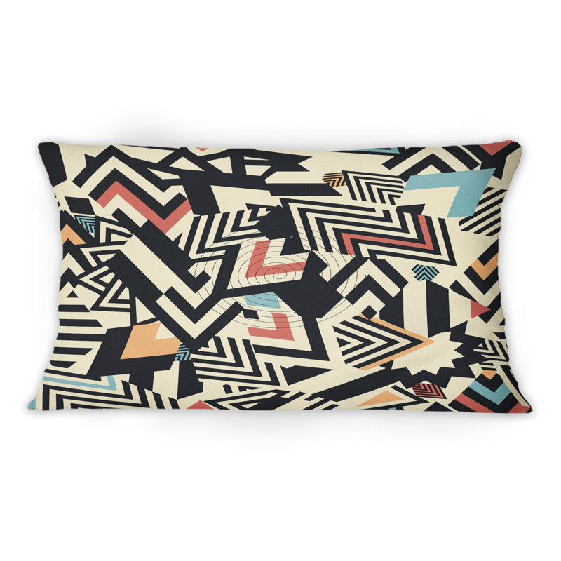 Coussin décoratif à motif géométrique bleu, orange et rouge