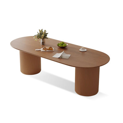 Tables de salle à manger ovales brunes en bois massif