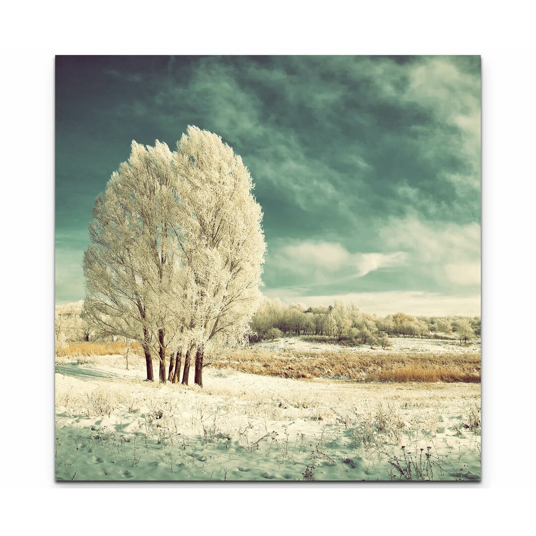 Leinwandbild Eisige Winterlandschaft mit Baum