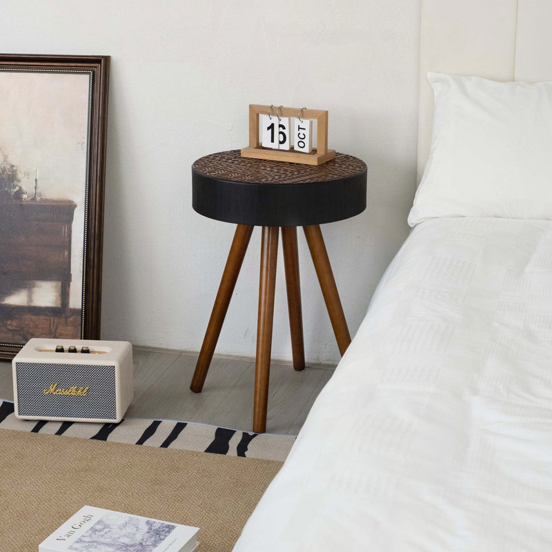 Table basse ronde avec plateau sculpté et pieds en bois massif - noir et brun, 15,7 po