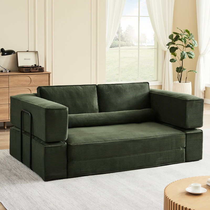 Canapé quatre places en velours côtelé kaki, suède confortable, combinaisons polyvalentes, idéal pour les moments de détente des parents dans un grand espace douillet à la maison.