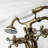 Kingston Brass Kingston Three-Handle 2-Hole Deck Mount Clawfoot Tub Faucet with Handshower-54357517