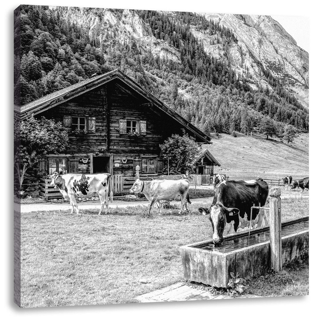 Leinwandbild Kühe vor Blochhütte auf Alben