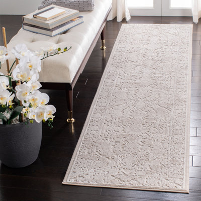 Calidia Oriental Creme/Ivory Area Rug